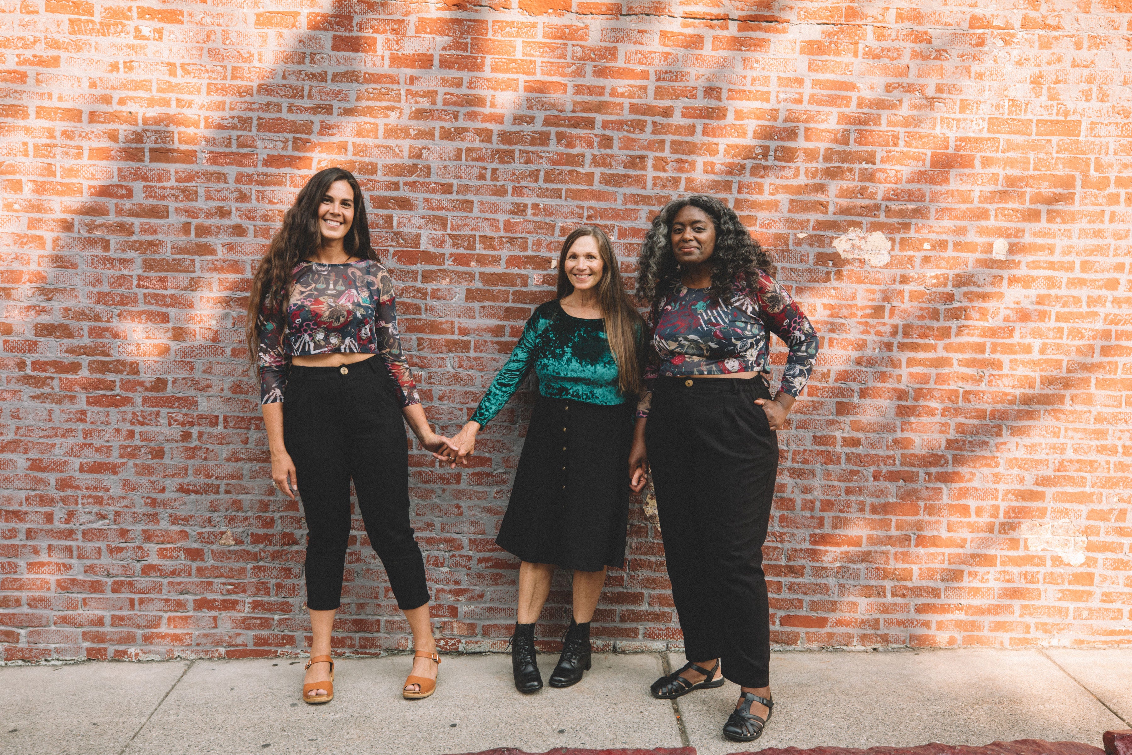 group of women all ages wearing crop tops 