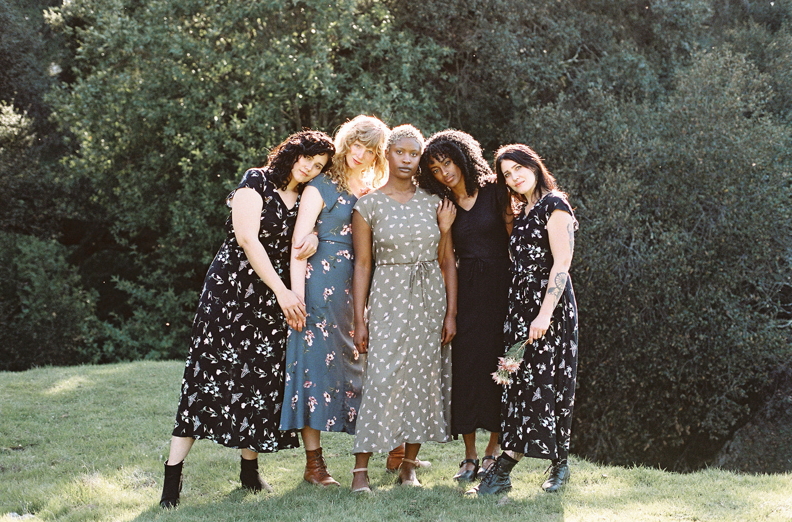 group of women in field day bias dresses 