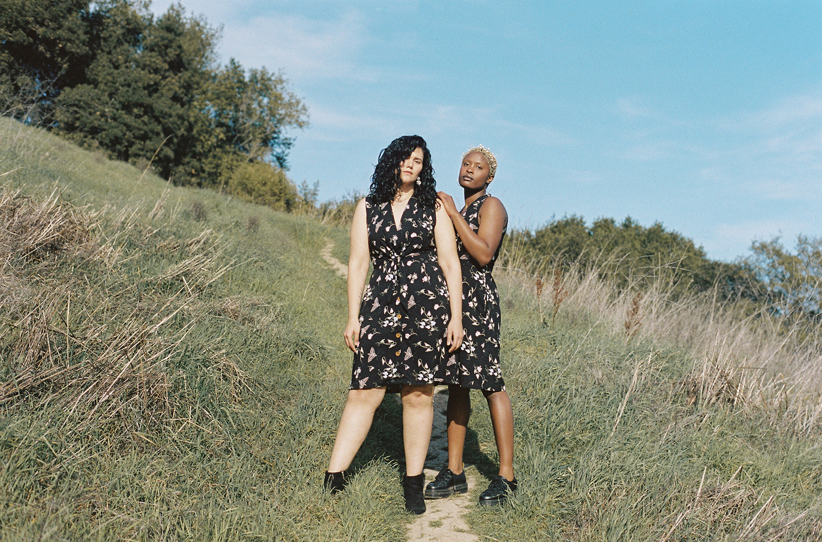 2 women wearing dresses with pockets plus size 