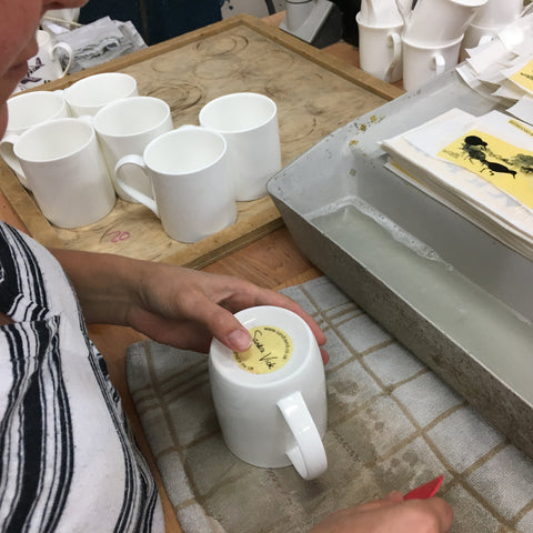 adding the base stamp to a mug