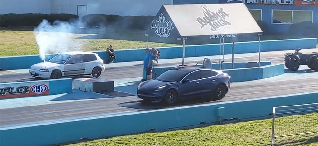 Tesla Model 3 AWD vs. Honda Civic drag race