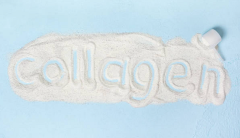 Text 'collagen' spelled out using collagen powder.