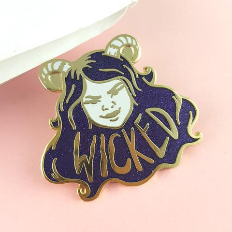 made from glitter and gold hard enamel this wicked fairy is a must have