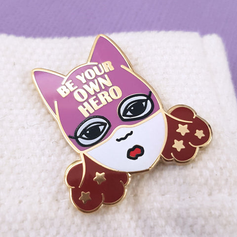 be your own hero pussy hat feminist lapel pin. because women need to stand up for themselves!