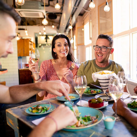 group of adult friends dining