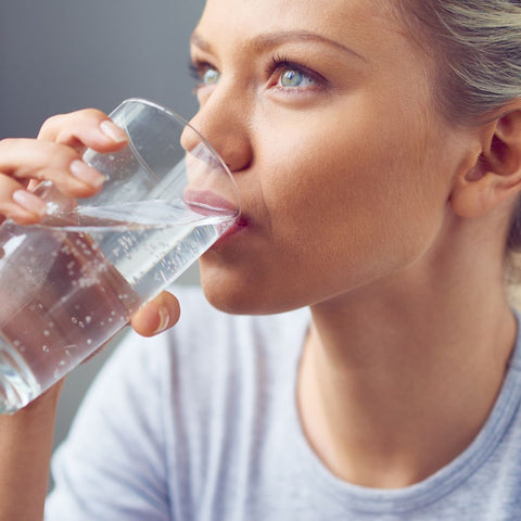 img of a woman drinking water