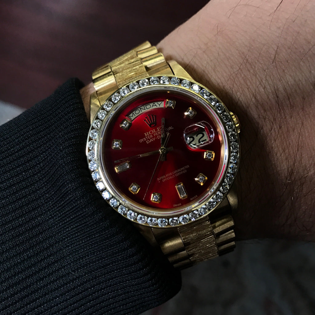 red rolex watch