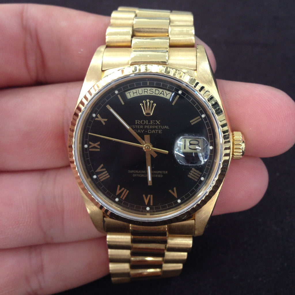 rolex day date black face