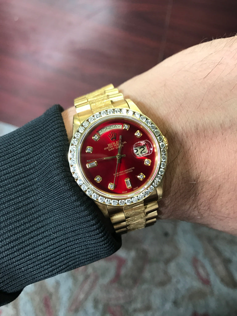 gold rolex red face