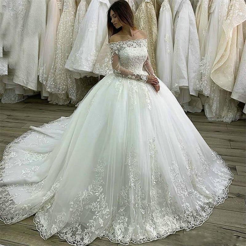 Vestidos de novia de corte de bola de manga larga