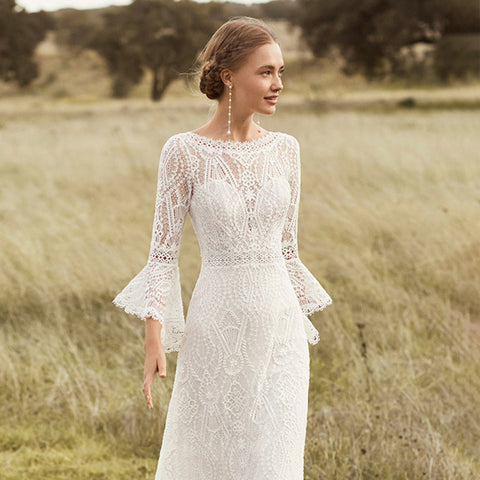 Vestidos de novia blancos de encaje con mangas abullonadas