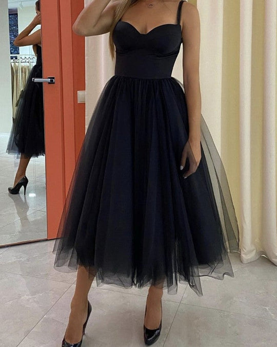 Vestidos negros pequeños para invitadas de boda