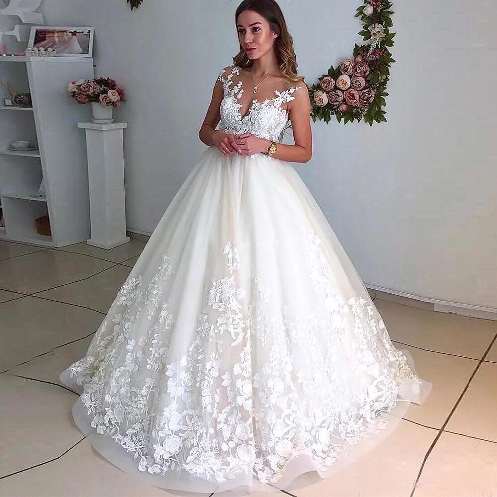 Vestidos de novia de encaje marfil