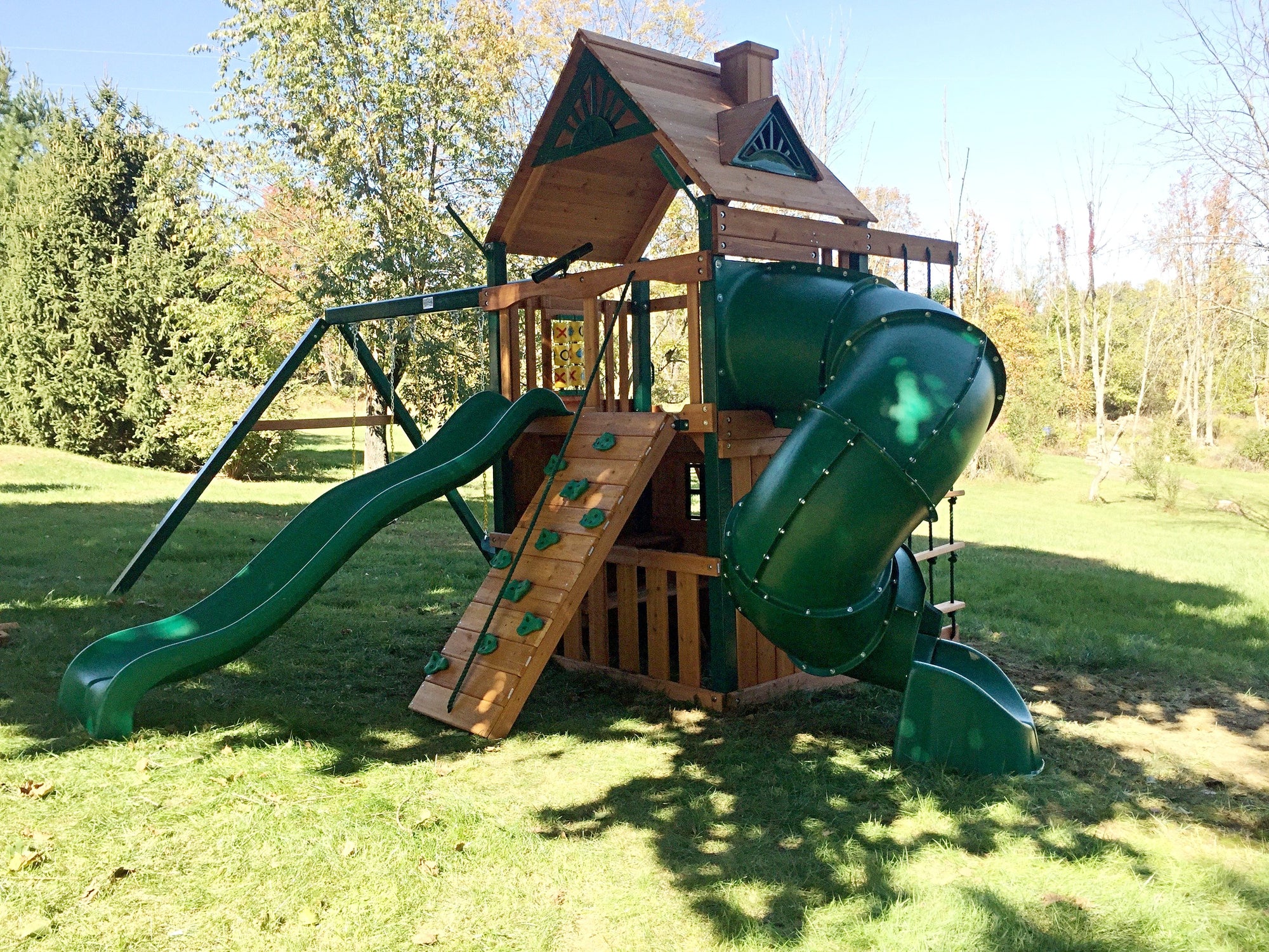 wooden swing set with clubhouse