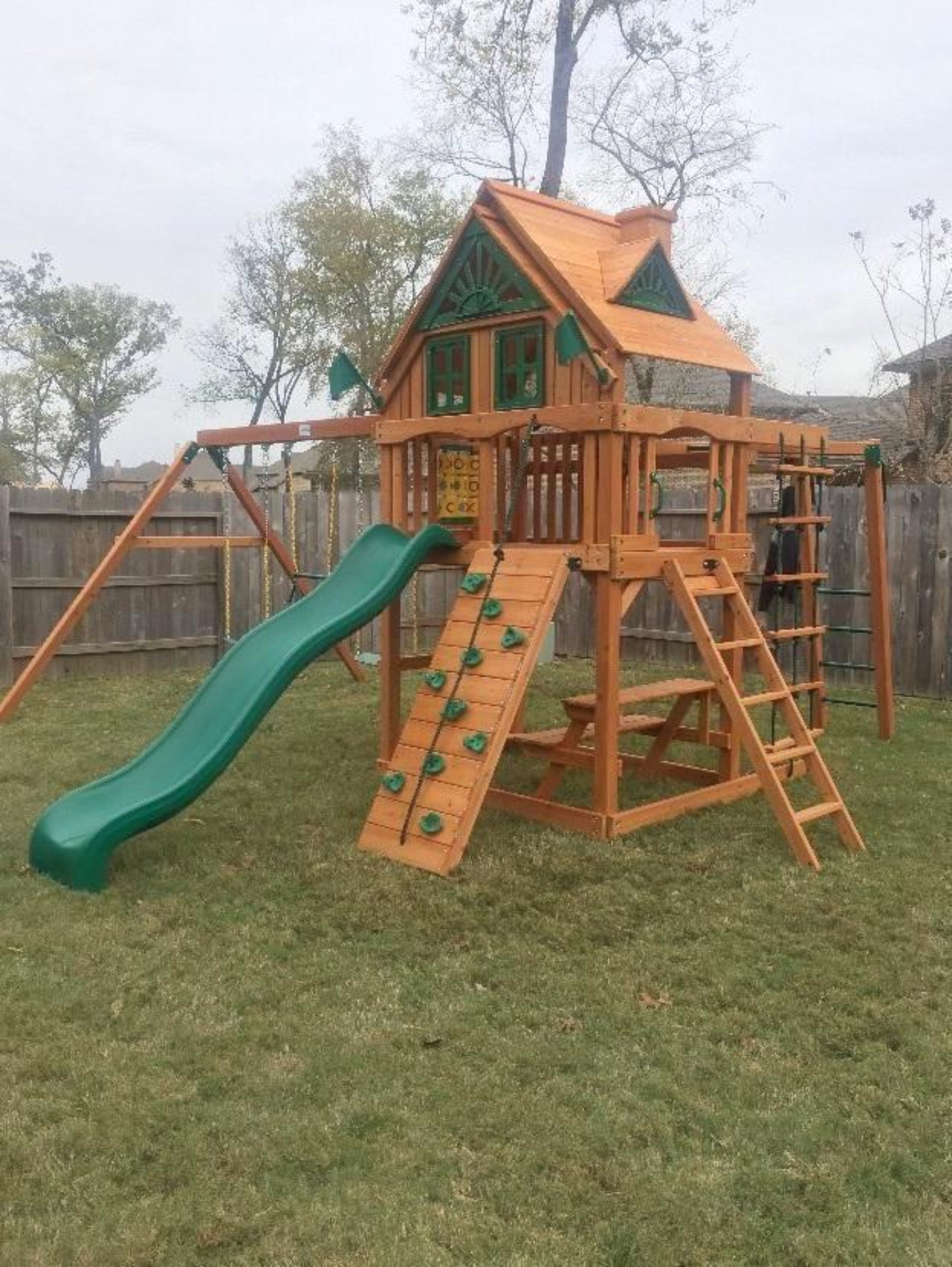 swing set with house