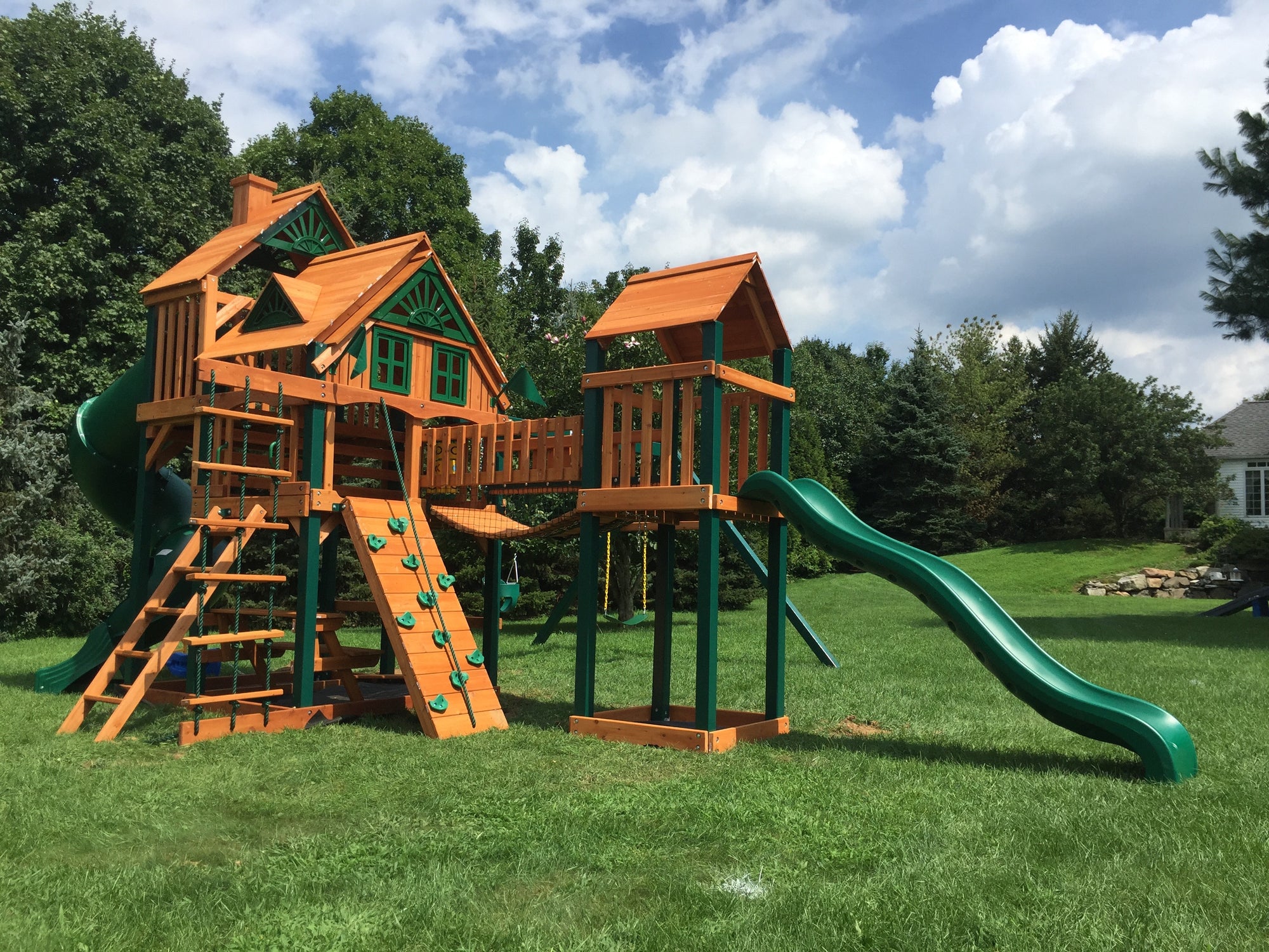 swing set with tree house