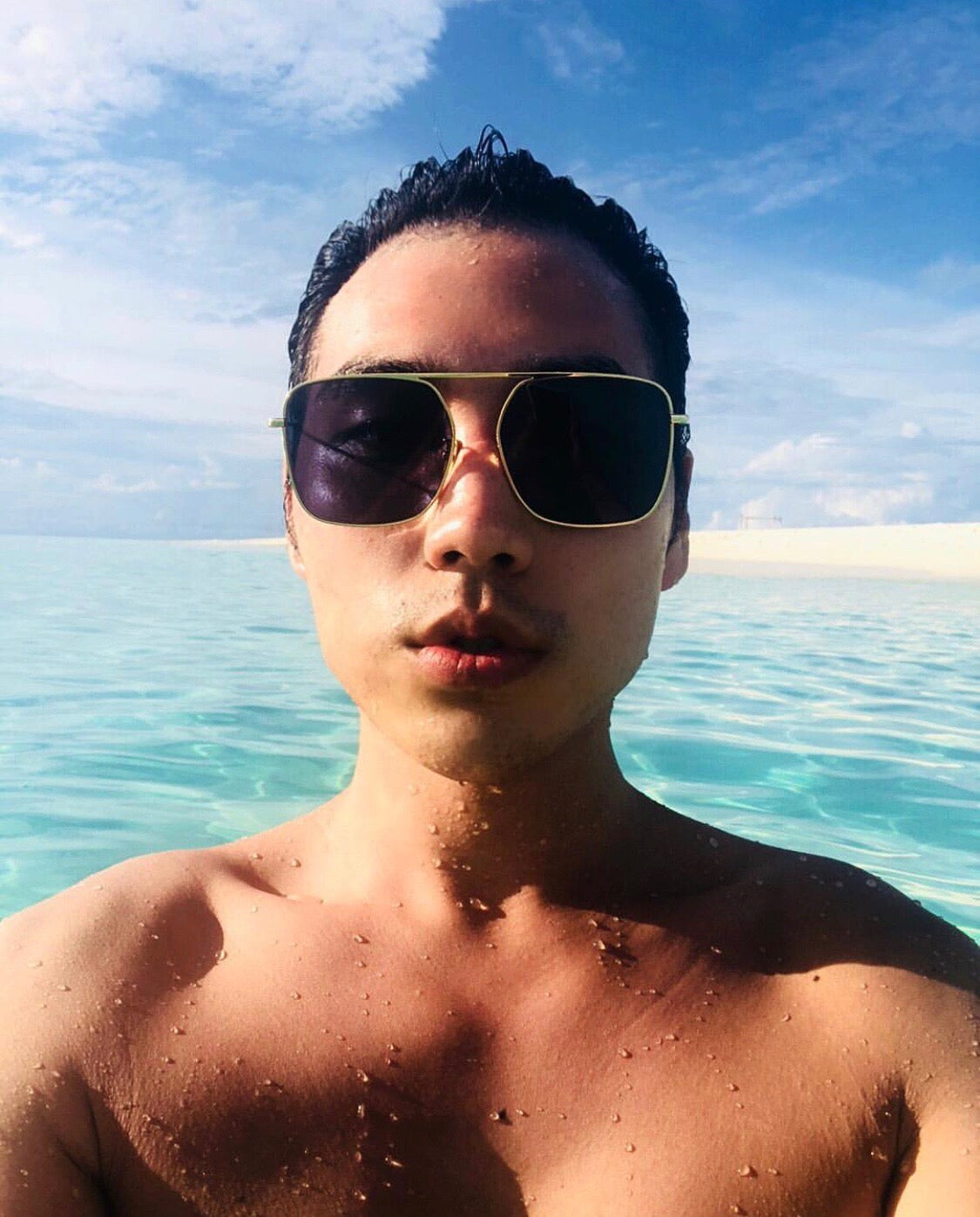 Fashionista Calvin Wang wears REVE by RENE BPM square aviator sunglasses