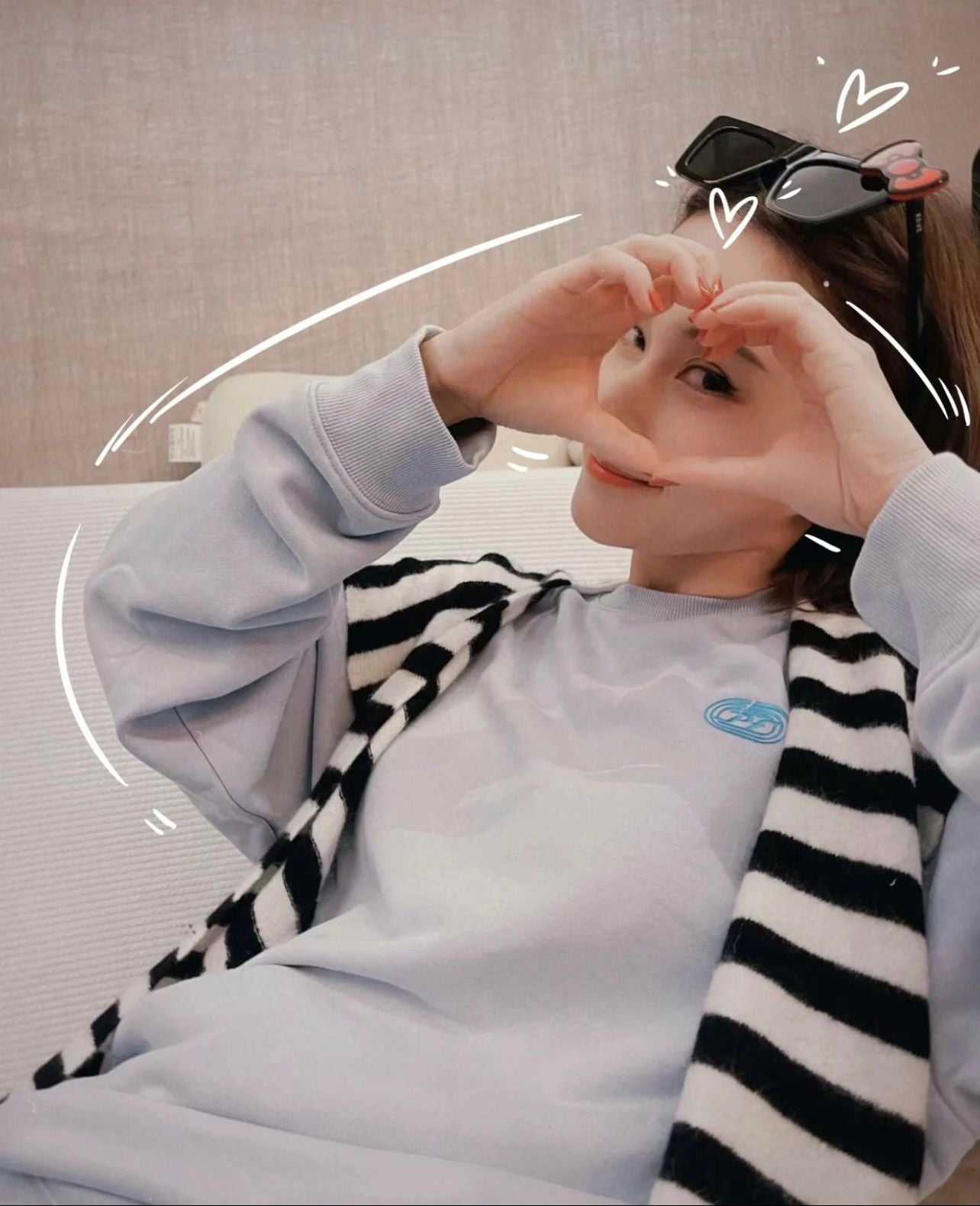 Laurinda Ho wears REVE x Hello Kitty collection sunglasses