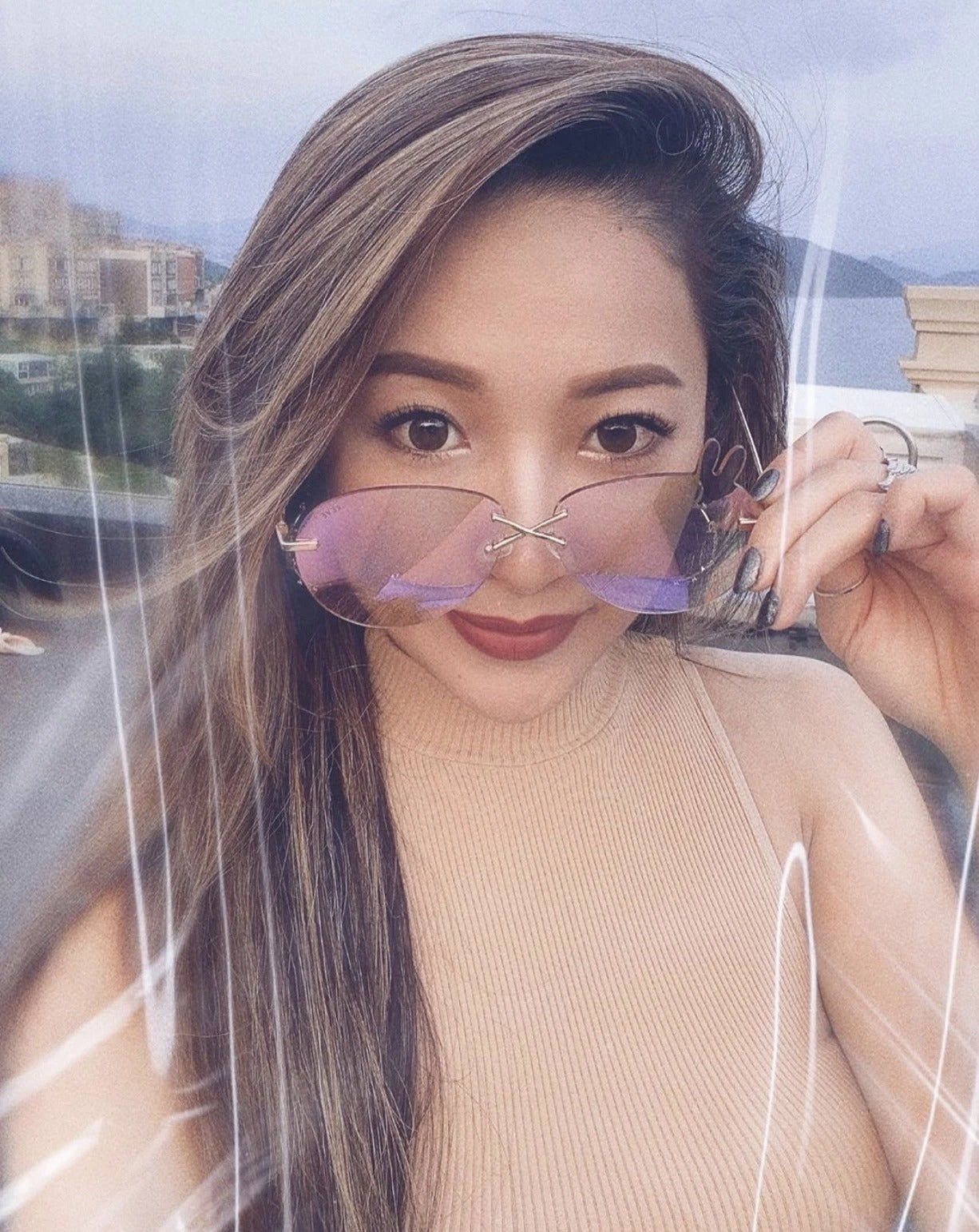 Sarah Zhuang wears REVE by RENE Miffy fairy dust sunglasses