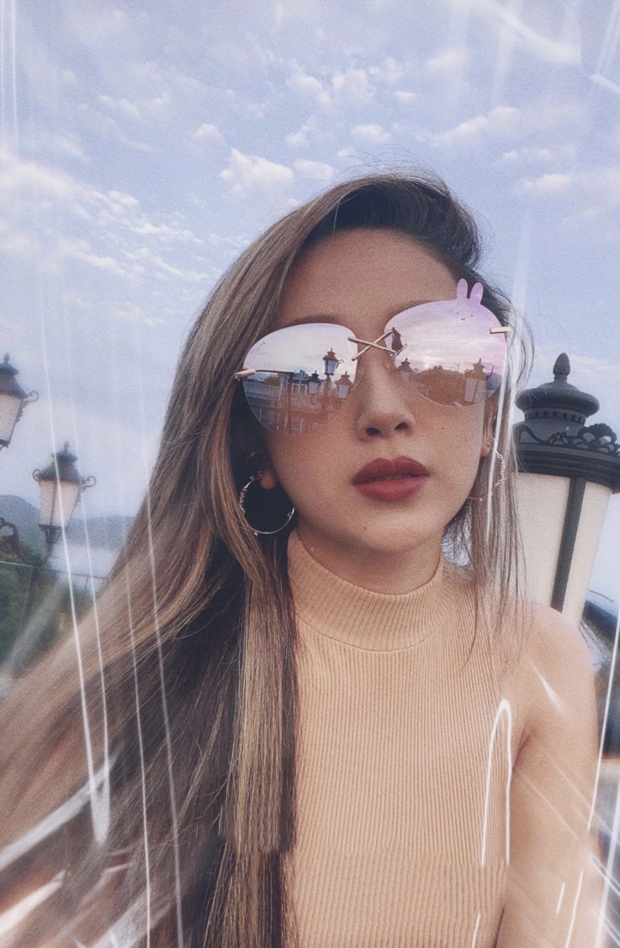 Sarah Zhuang wears REVE by RENE Miffy fairy dust sunglasses