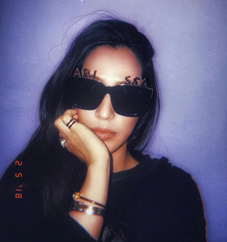 Arissa Cheo 石貞善 wears Reve by Rene alphabet sunglasses