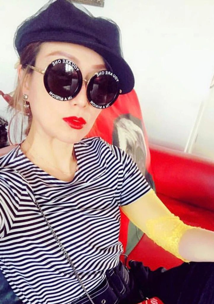 Sammi 鄭秀文 wears REVE by RENE Minions sunglasses
