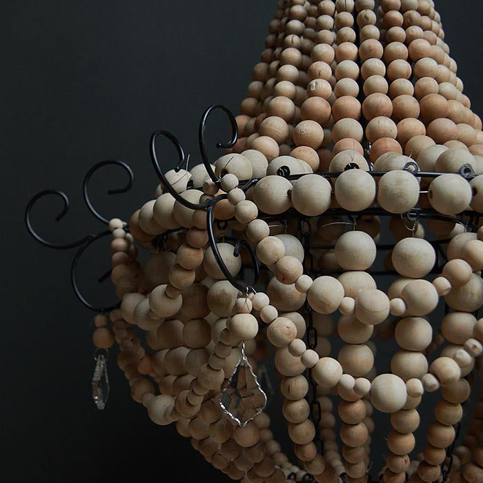 Large wooden and glass beads on a wire framed chandelier