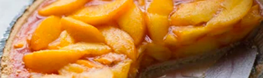 Close up on a dish of peach pie