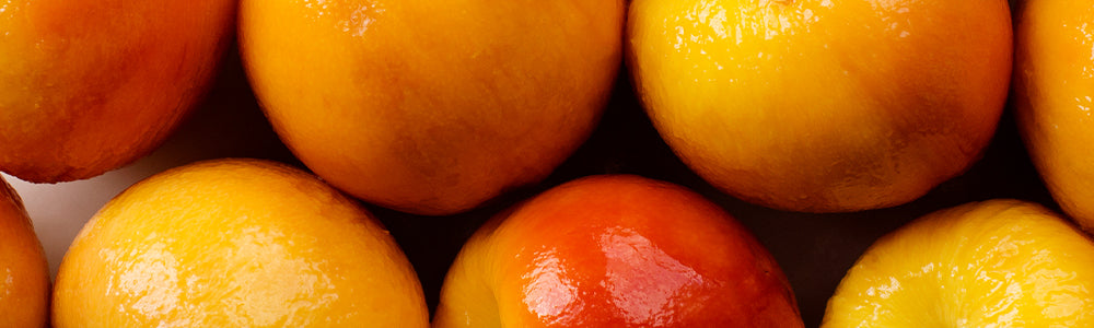 Close up on peeled peaches