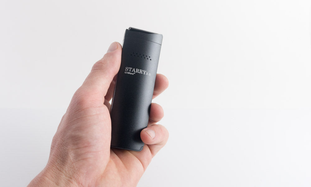 XMAX starry vaporizer in hand