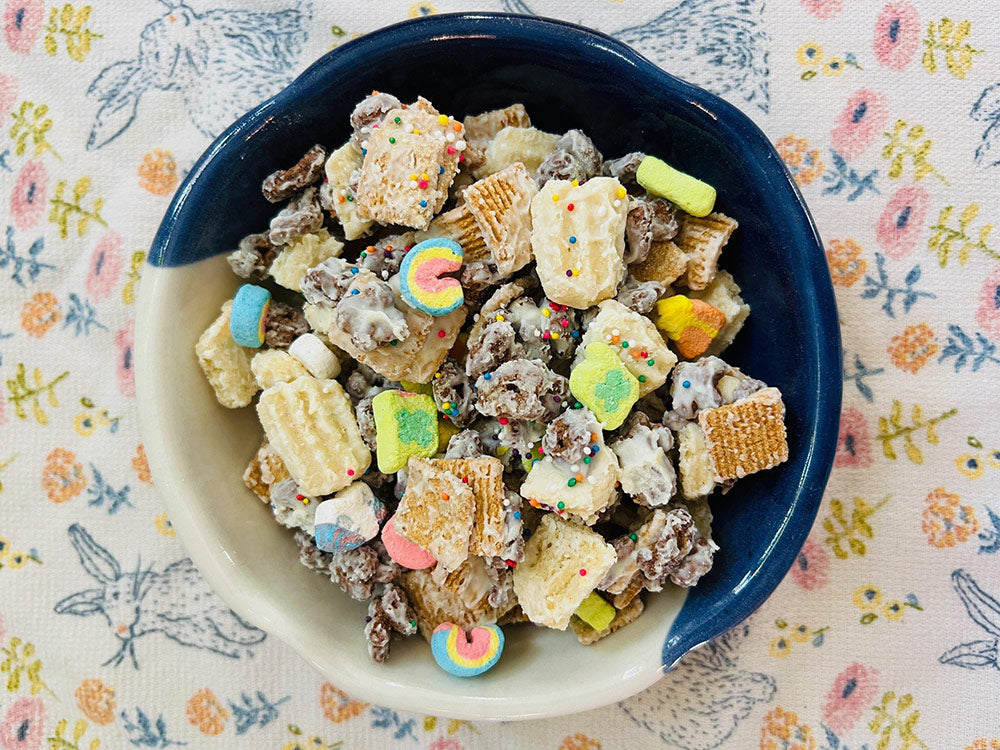 easter snack ideas with britts spirtz cookies in snack mix on pretty easter tablecloth
