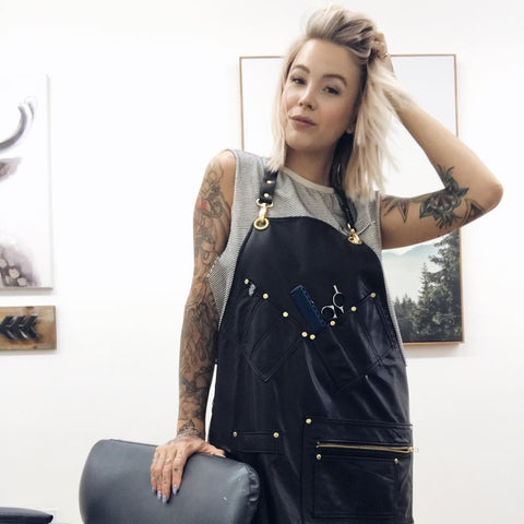 Emily Jacob in a leather S&R apron