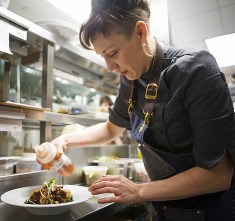 Chef Sarah Stewart of Juniper Vancouver wearing Search and Rescue Denim Co Chef's Apron