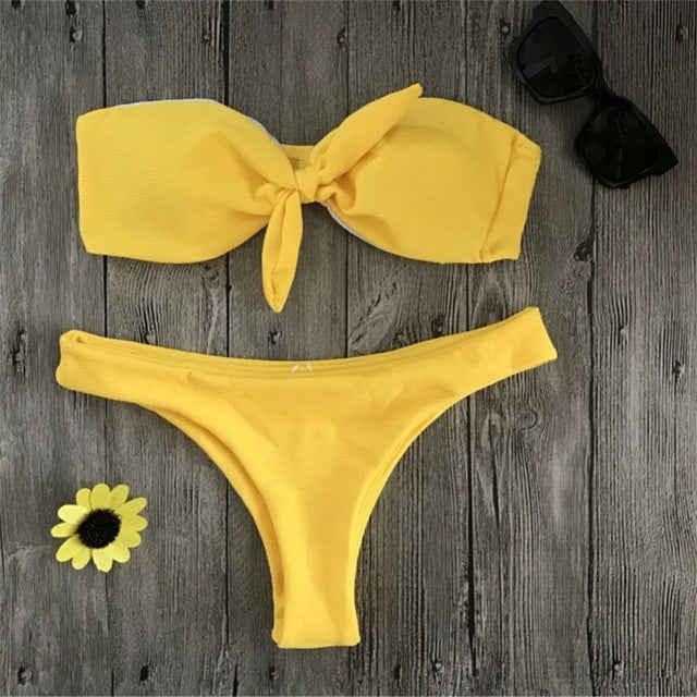 white and yellow swimsuit