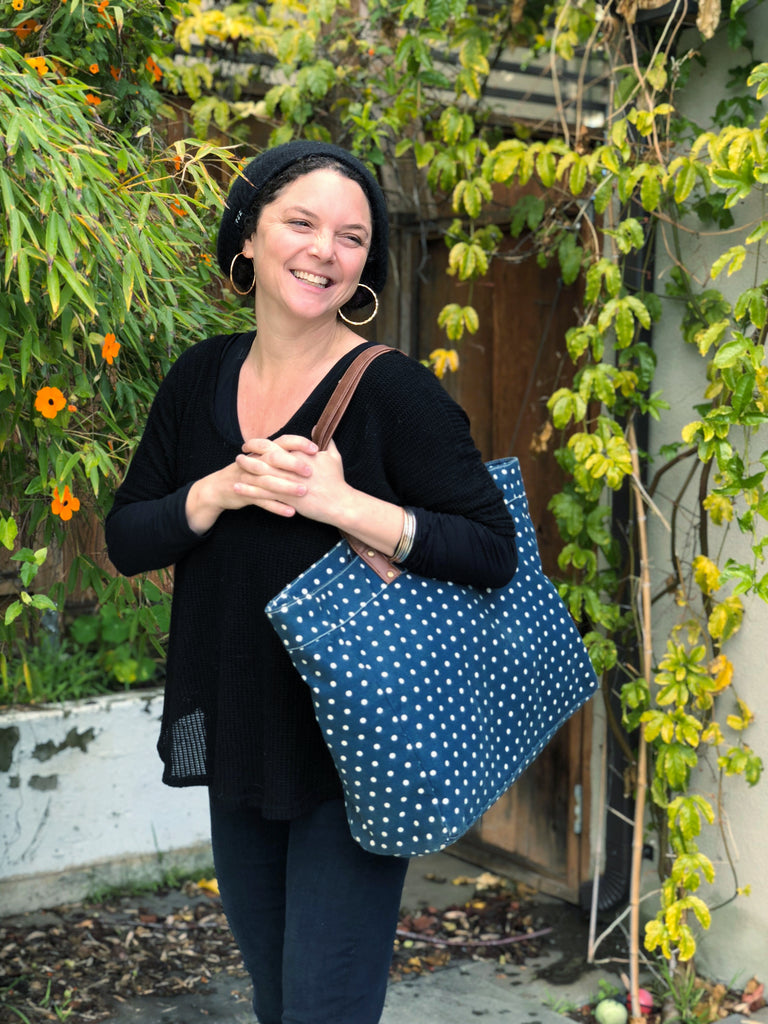 Woman with MAIKA Dots Navy Carryall Tote