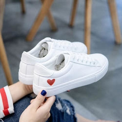 ladies white flat shoes