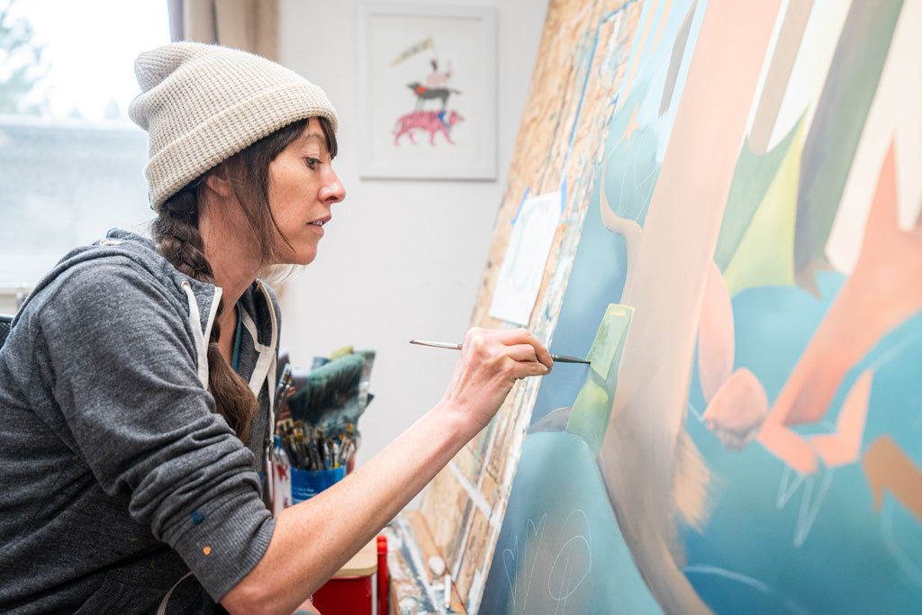 Megan Myers Painting In Her Studio