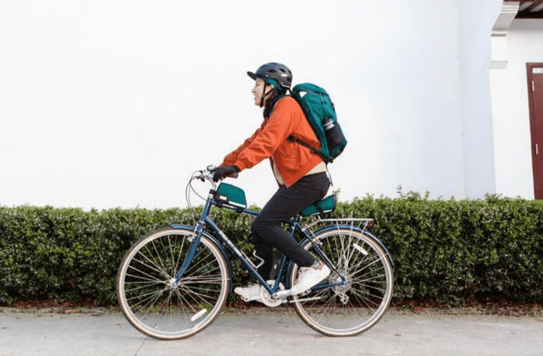 Lady riding on bike with Two Wheel Gear