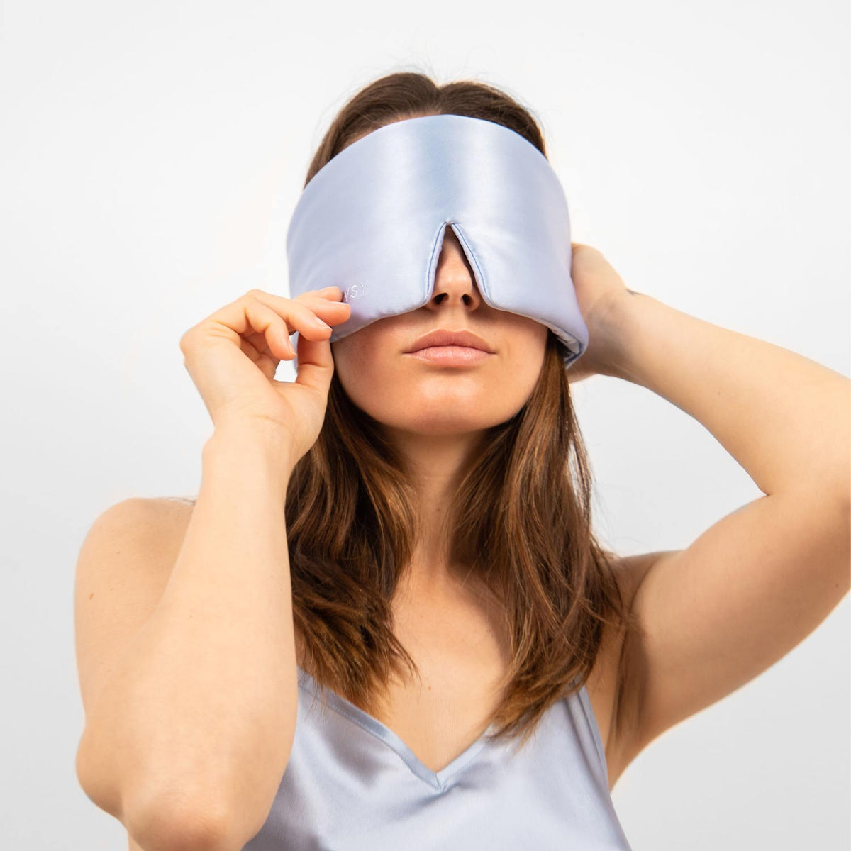 Model with Drowsy Silk sleep mask covering eyes