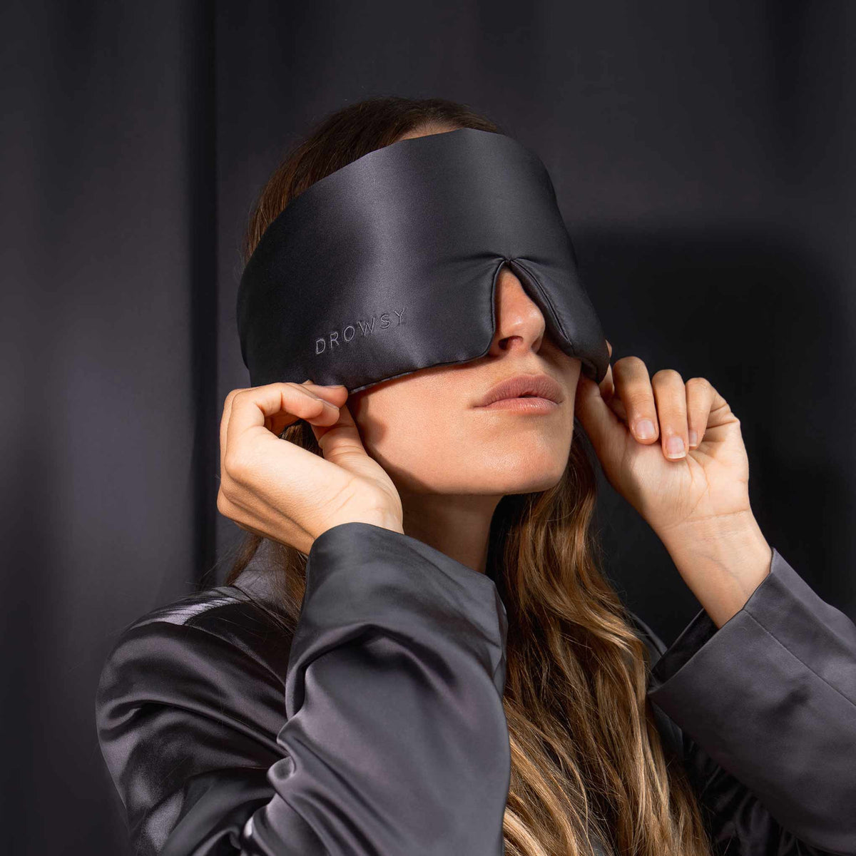 Model with Drowsy Silk sleep mask covering eyes
