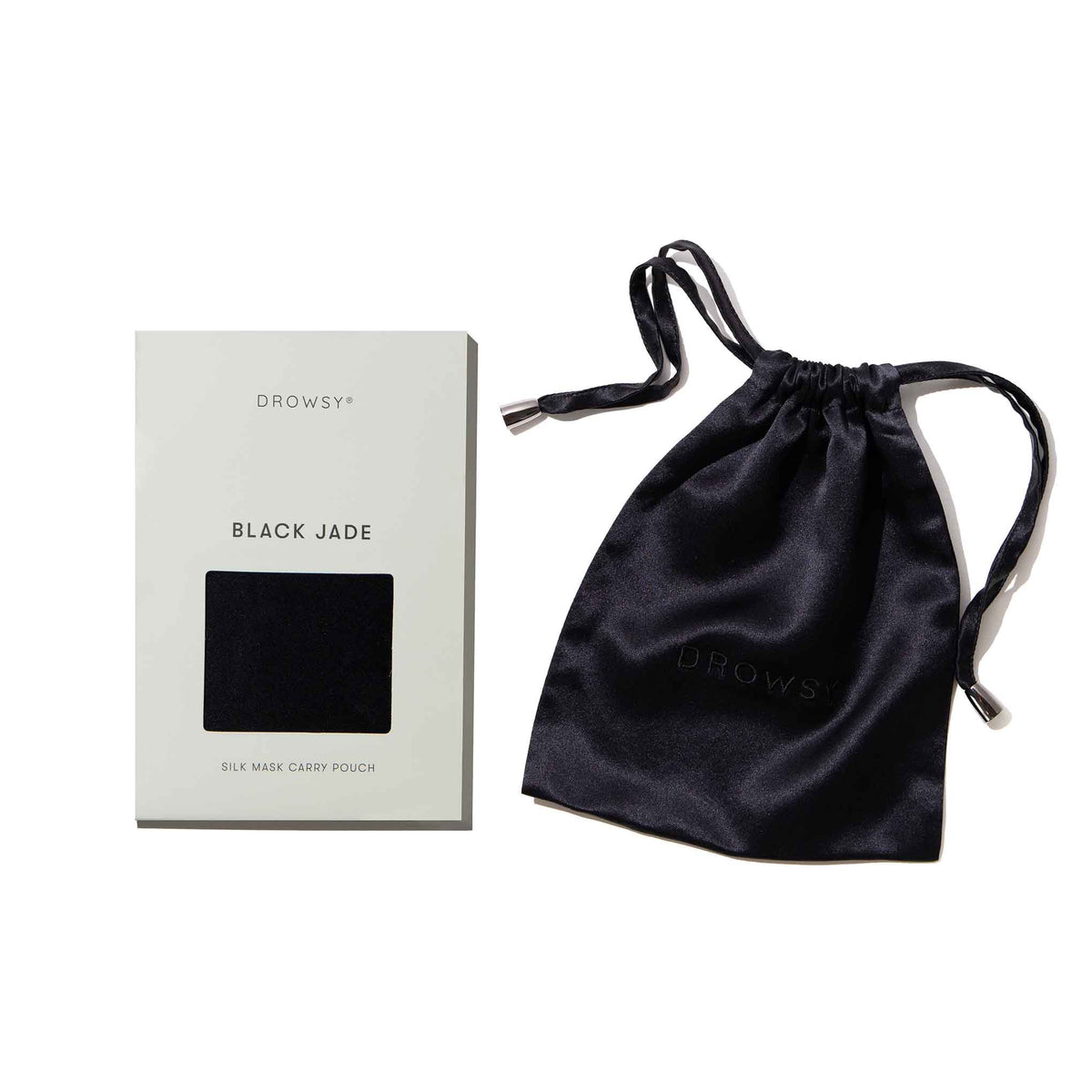 Black silk bag with box on white background