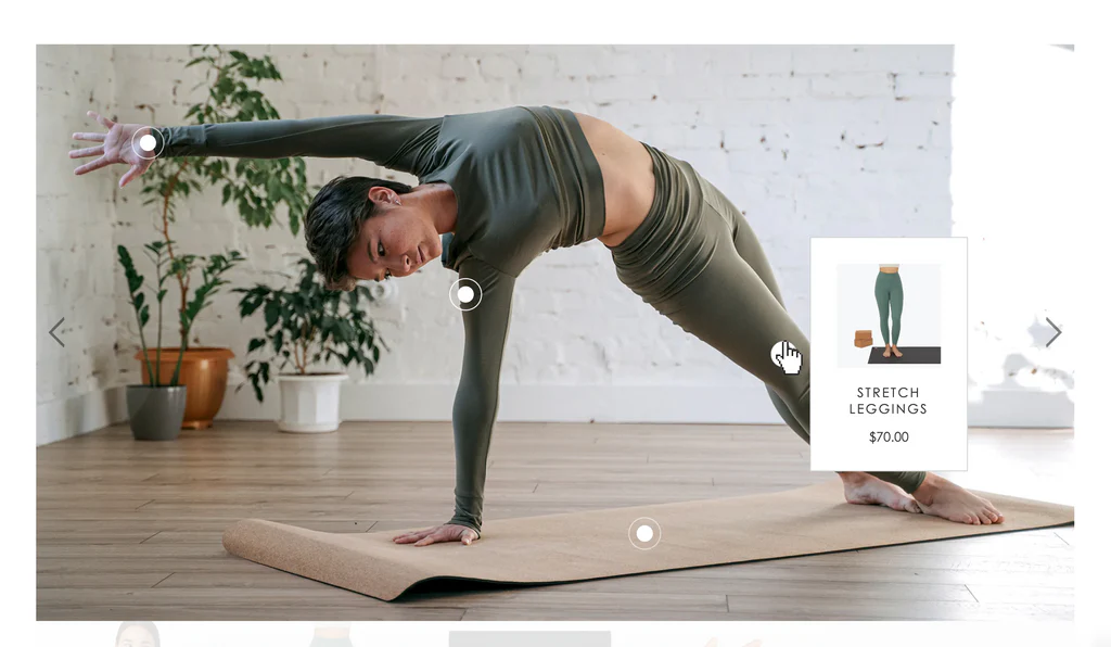 woman in yoga pose with leggings product identified with hotspot in shoppable image section