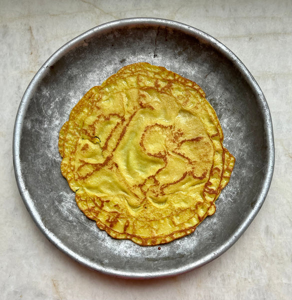 Split Moong Dal Crepes With Coconut Milk