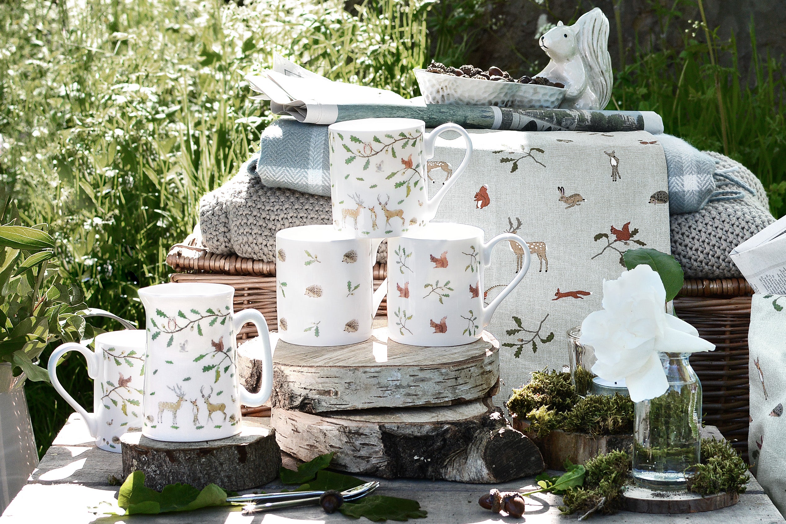 Fine bone china mugs outside with woodland setting