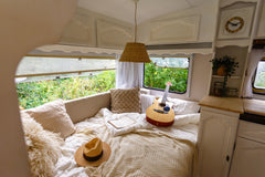 cute bed in an airstream trailer