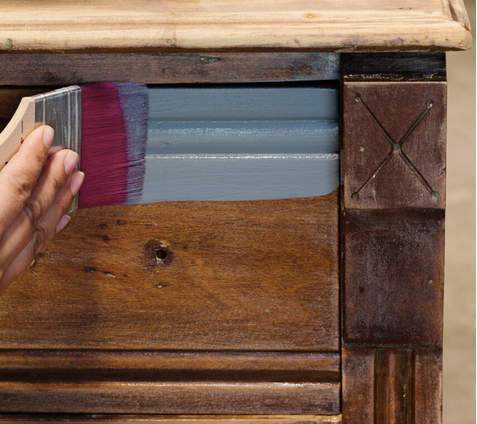 Painting fusion mineral paint on a dresser