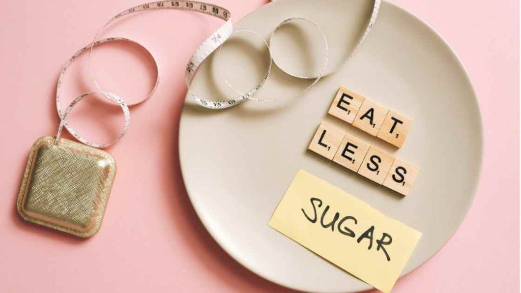 plate with the words"eat less sugar" on it 