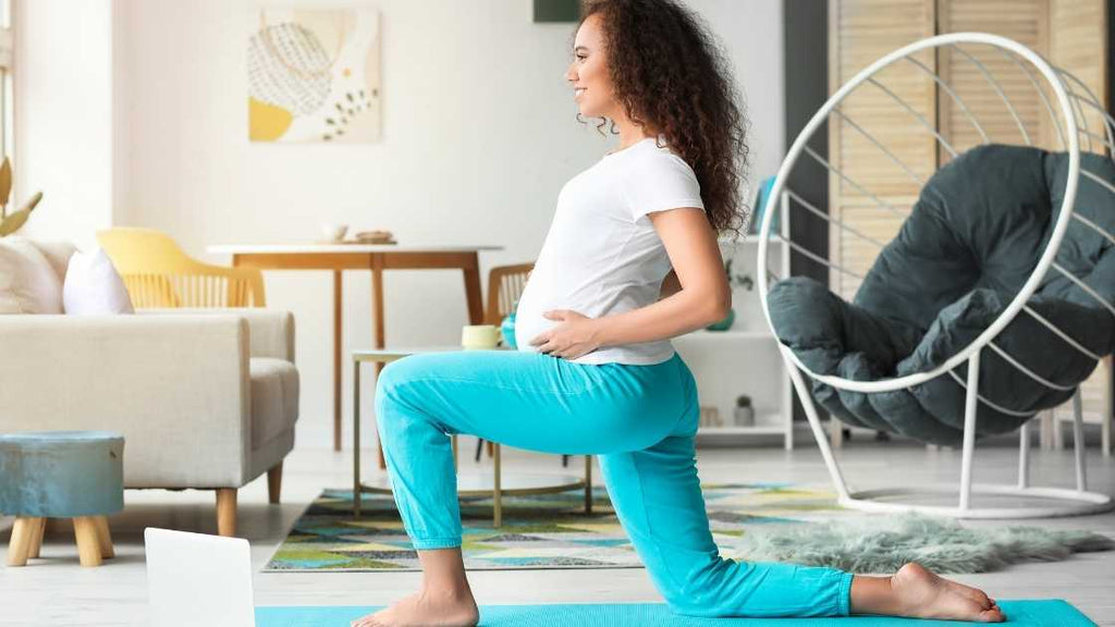 pregnant woman performing the get up exercise routine