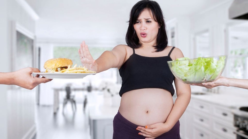 pregnant woman avoiding foods that make her nauseous