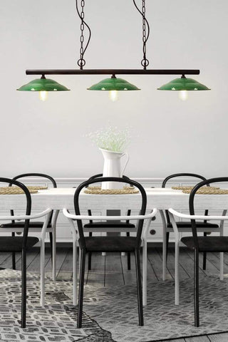 Linear pendant light over dining table
